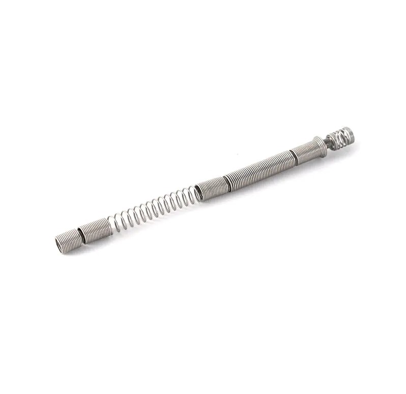 Stainless steel medical spring assembly featuring a central compression spring with threaded ends and knurled adjustment knob, designed for medical device applications